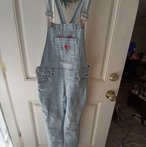 Young girls light color denim overalls